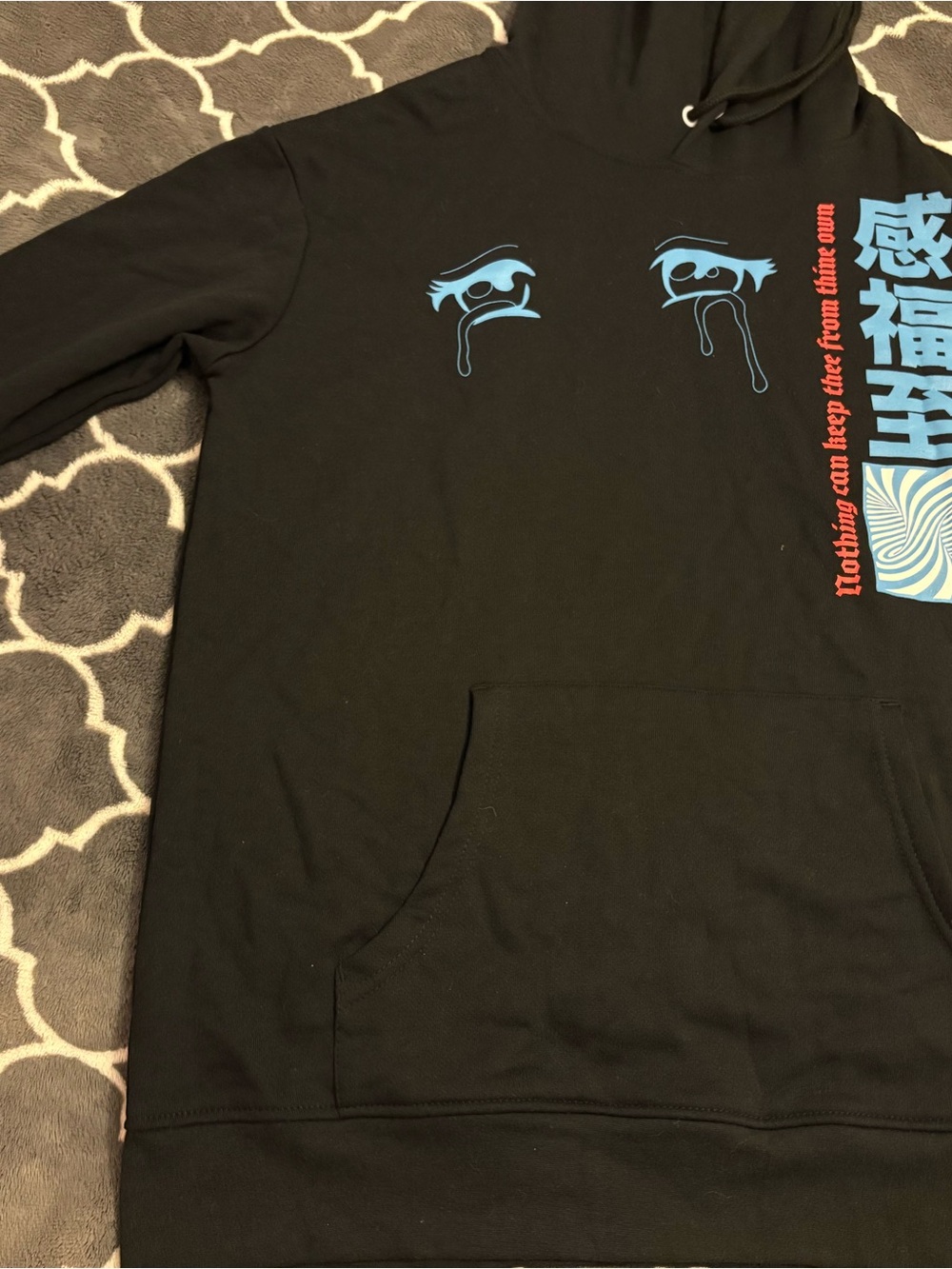 Spencer's Black Hoodie with Blue Tear Graphics and Red Accent